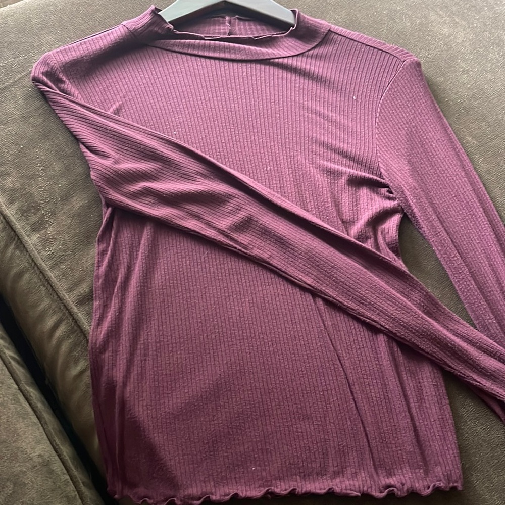 Maroon form fitting long sleeved shirt
